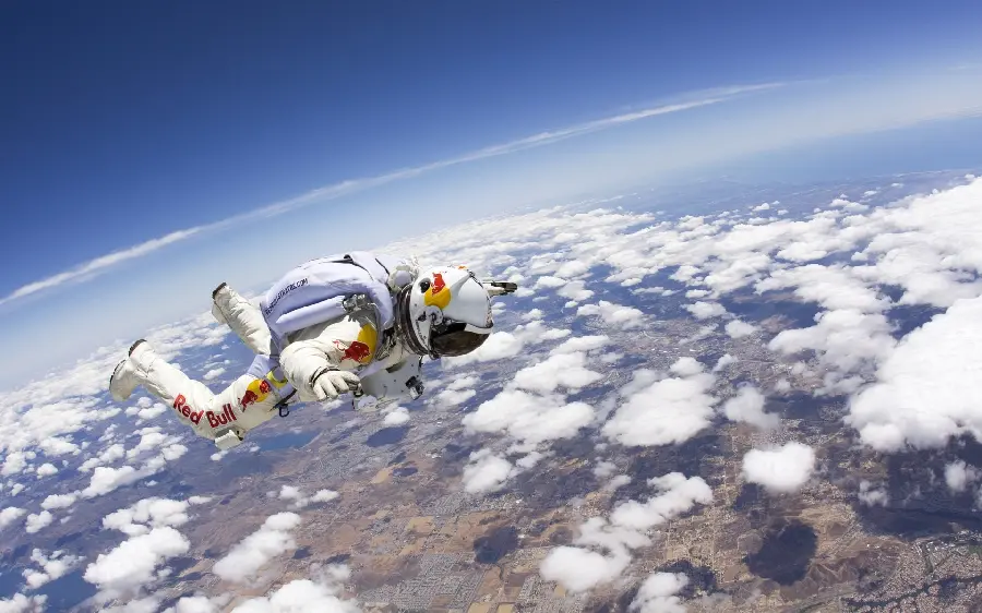 Download the background wallpaper 4K of an astronaut in a white suit from the Red Bull brand in pure quality