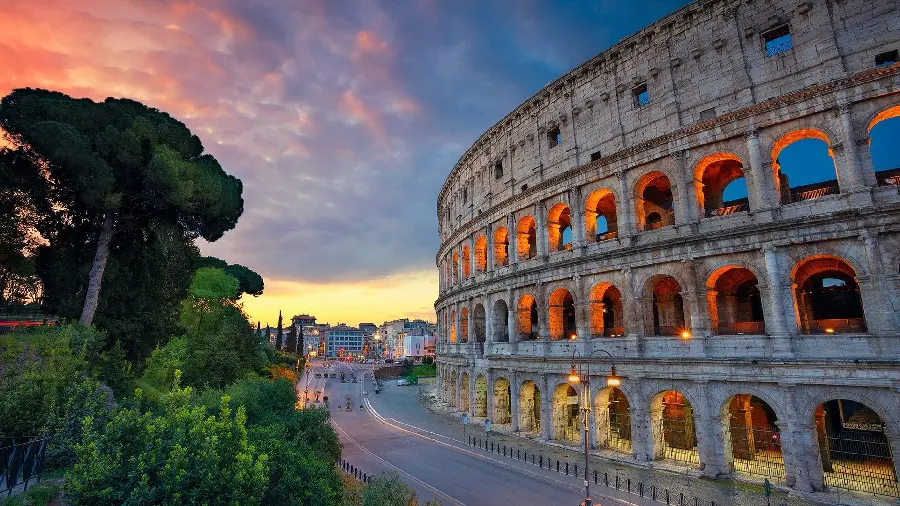 Download beautiful background of the street next to the Colosseum and green trees next to it
