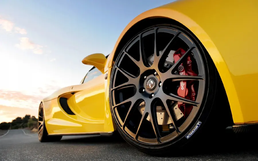 Photo of luxury yellow car rims for profile