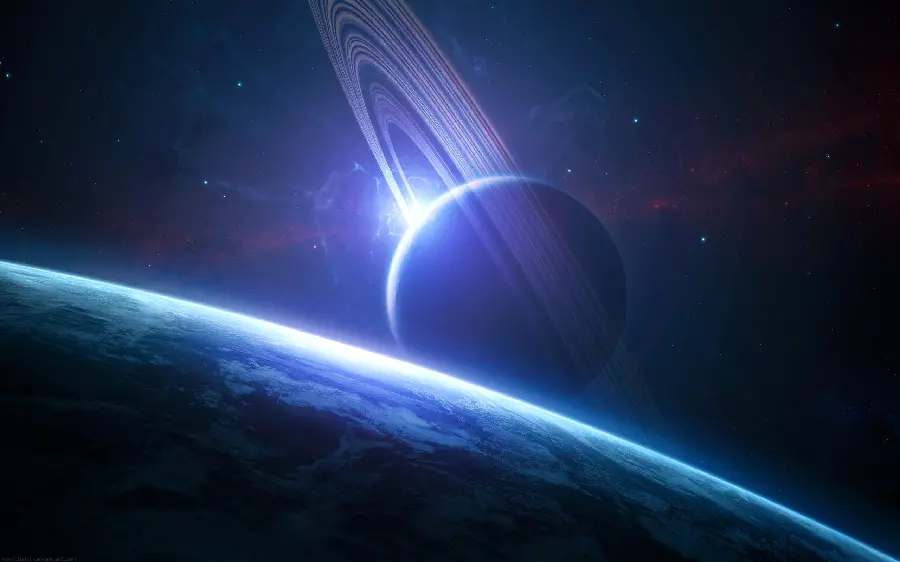 Dreamy Saturn Planet Background Photo with Blue Glowing Theme in Space