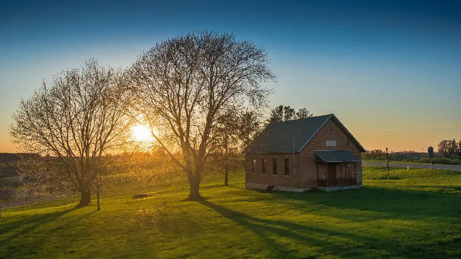  Interesting pictures of the sunset and a forest hut in nature with two trees next to it