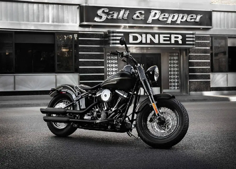Stock image of new technology on a black motorcycle at a motorcycle track