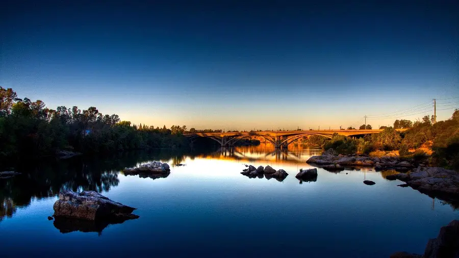 A masterpiece HD wallpaper of the reflection of sunset nature in the water of the Nile River