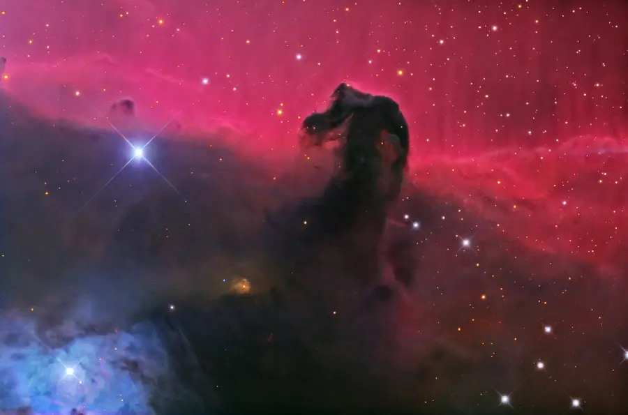 Download a dark background photo of the Horsehead Nebula in the constellation Orion formed by cosmic dust