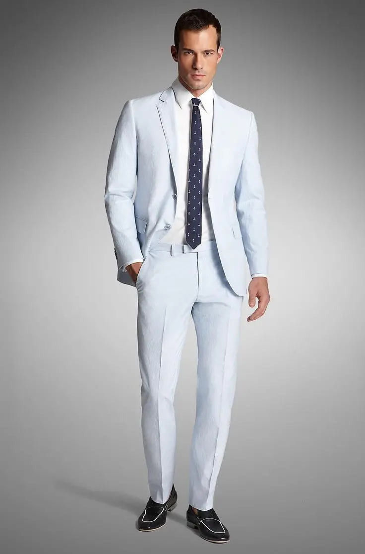 New photo of a luxurious male model with an attractive suit in bright colors 4K