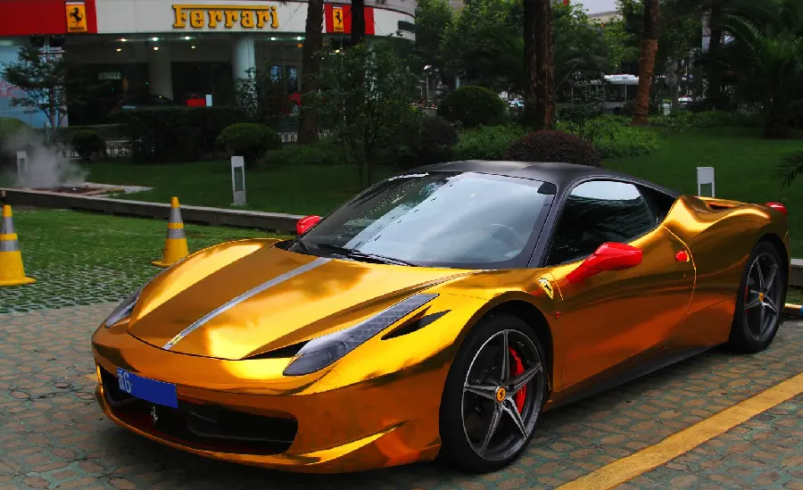 Download a unique image of a powerful Ferrari car in gold for your profile