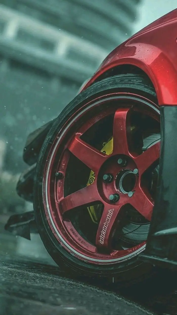 Unique wallpaper of red sports rims for your phone