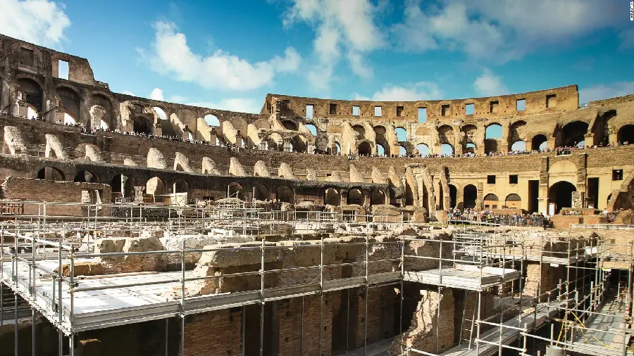 Download a pleasant and under reconstruction photo of the Colosseum, the power of ancient Roman architecture and engineering