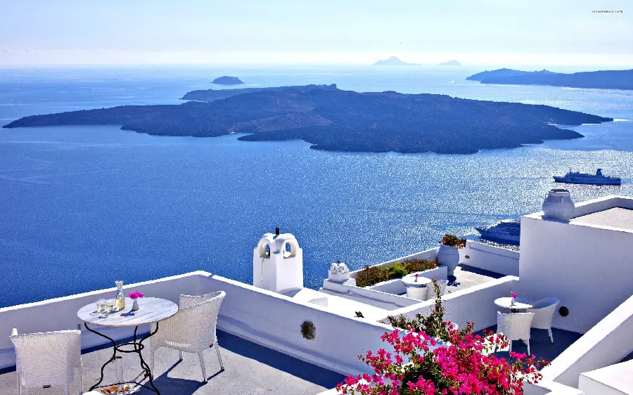 Cool wallpaper of a modern coffee shop with a beautiful view in Santorini