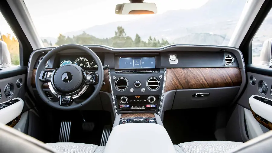 Awesome profile photo of white seats and dark gray parts in the interior of a Rolls-Royce