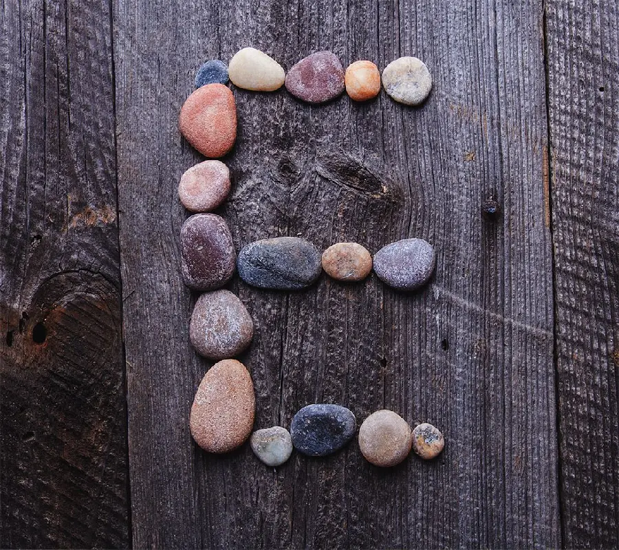 Artistic view of special Chinese stone with English E design for profile 