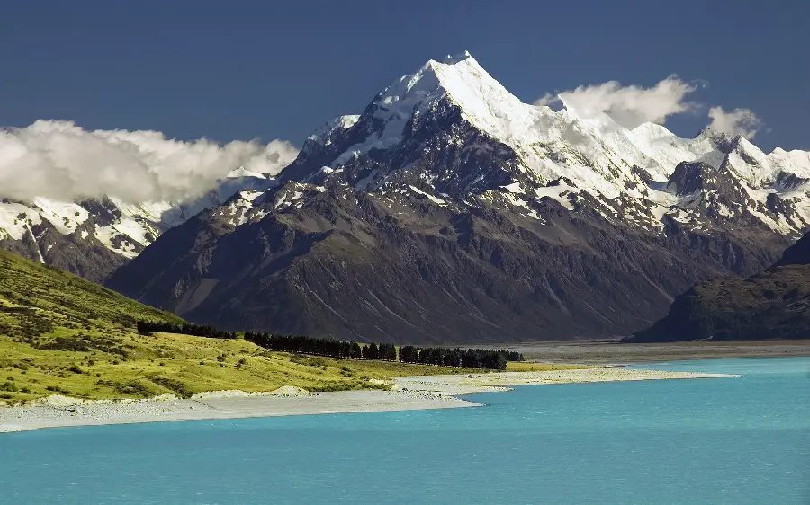  Masterpiece wallpaper of a pleasant snowy mountain near the blue sea 2022