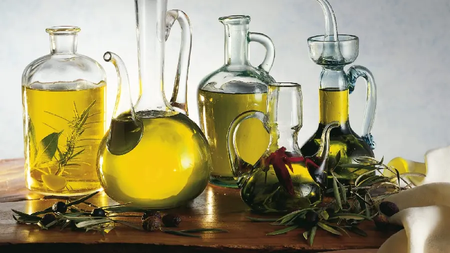 Various containers of olive oil with eye-catching glitter in a high-quality artistic view 