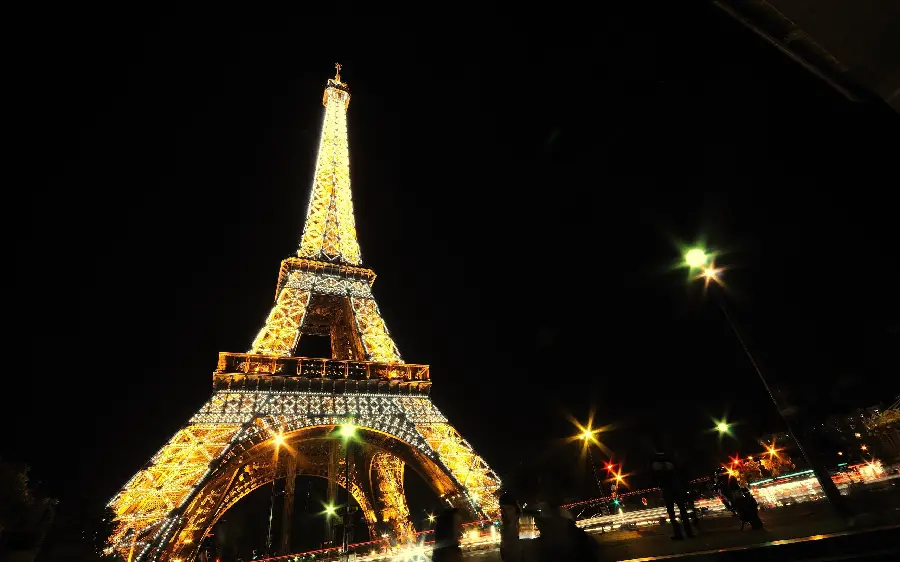 A modern fantasy photo of the Eiffel Tower in Paris, a symbol of French culture, at night