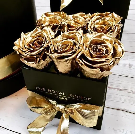 The most beautiful poster of a golden rose box with a special golden ribbon, a full quality gift
