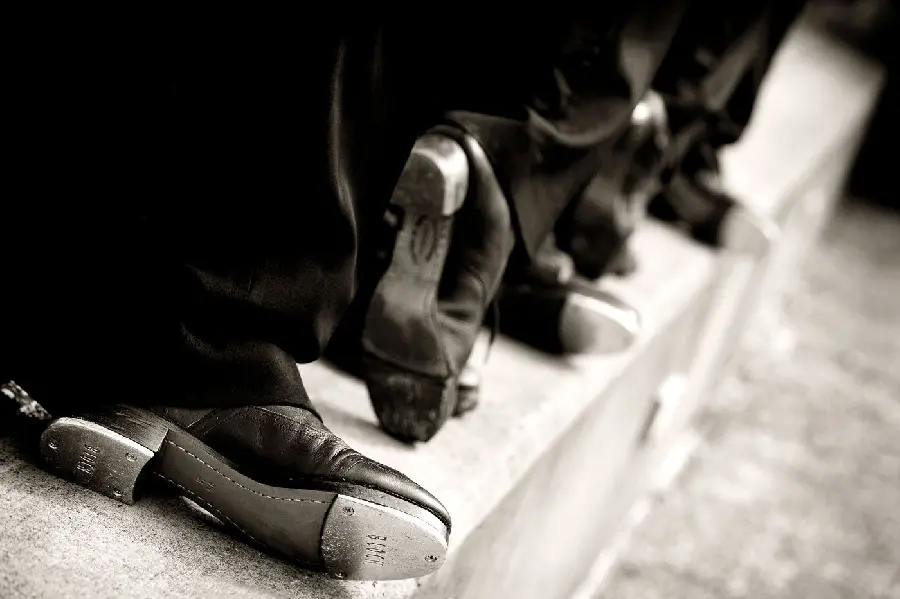 Strange Black and White Image of Shoes from Different Angles