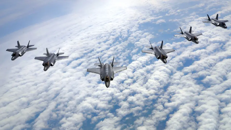  Background of powerful warplanes flying over the cloudy sky 