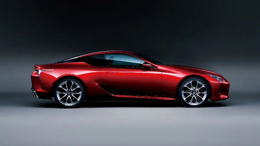 New background of a red Lexus LC 500 from the right on a gray background
