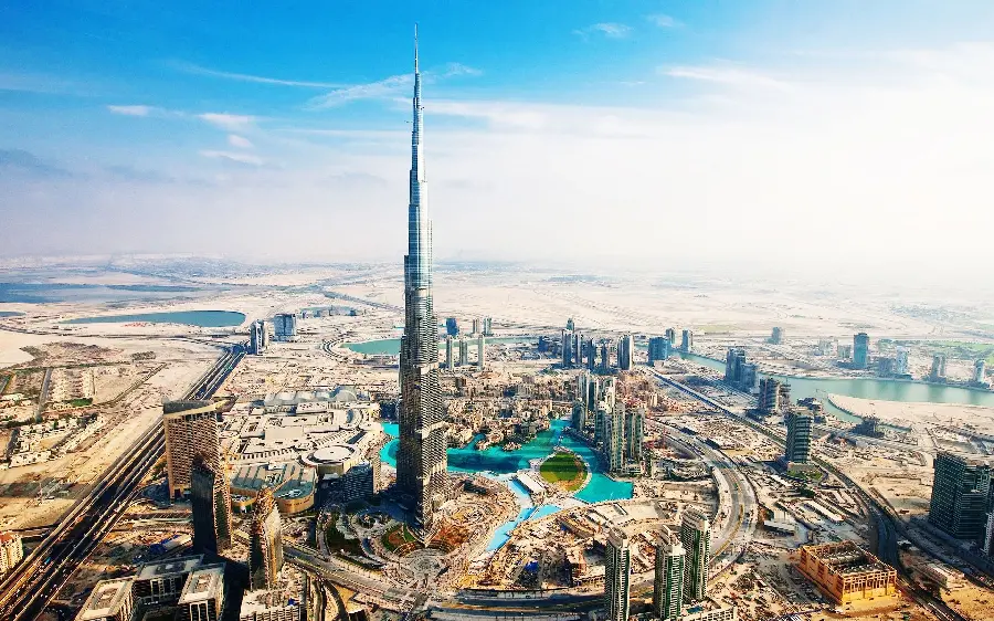 Download a masterpiece stock photo of the Burj Khalifa, the tallest structure and beautiful and new buildings in the country of Dubai, in hd quality