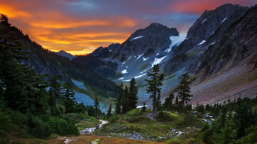 Dreamy image of lush mountain nature at sunset for Widescreen