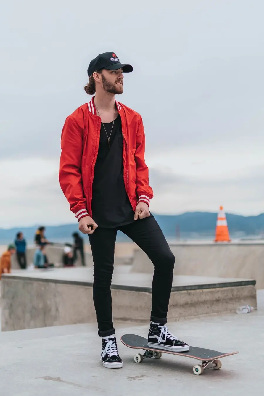 New modeling image of a skateboarder with a handsome red and black suit