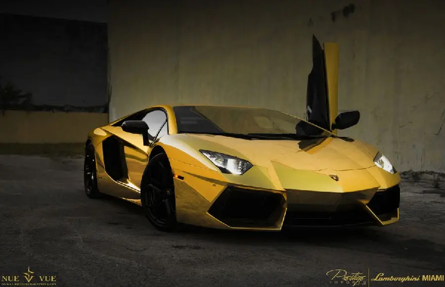 Stylish laptop background with a golden Lamborghini design in special quality