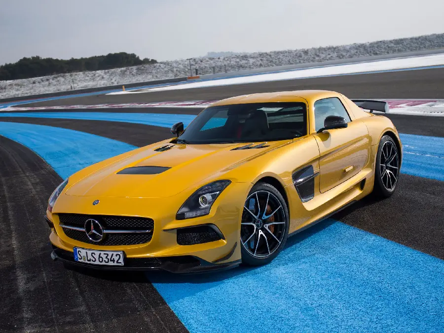 The latest popular model of yellow Mercedes-Benz on a black and blue racing track