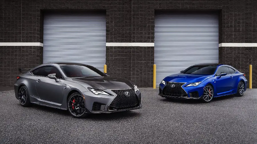 Stunning background of two Lexus RC F cars with a special design racing in front of a parking lot