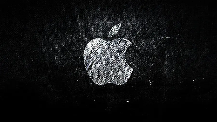 Old Scratched Black and White Poster of White Bitten Apple on Black Background