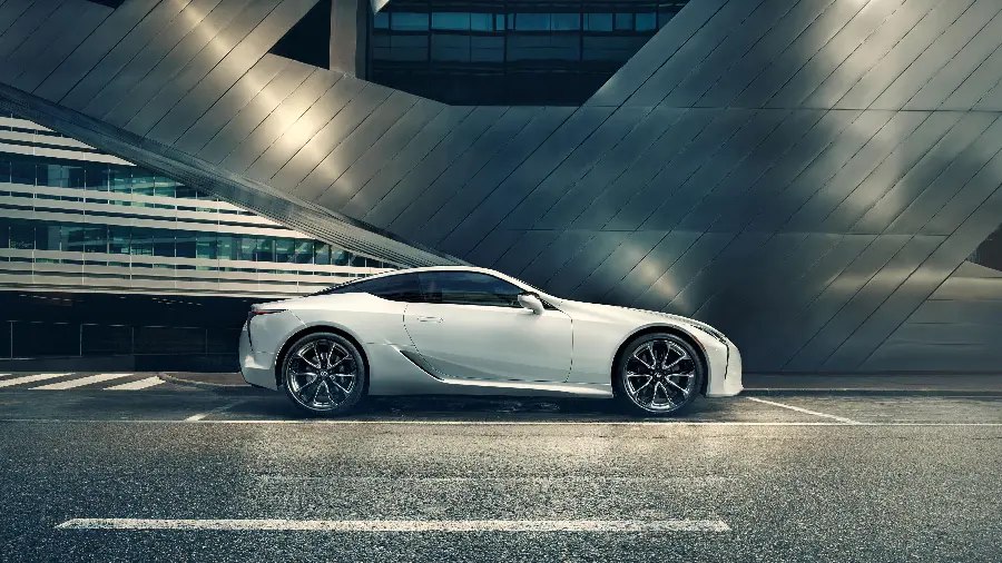Photo of aStock Lexus LC 500 White in front of a building