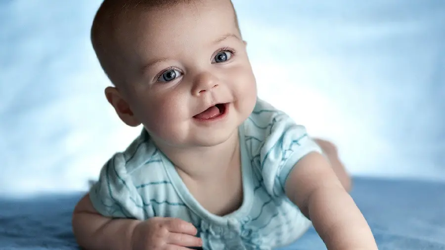 A lovely smiling image of a baby crawling on all fours 8K