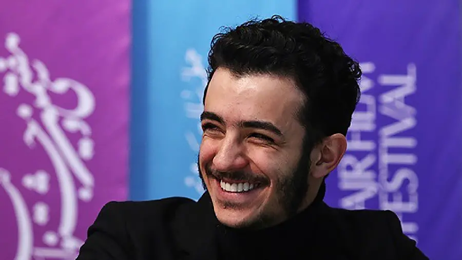 Ali Shadman smiling background at Fajr Film Festival