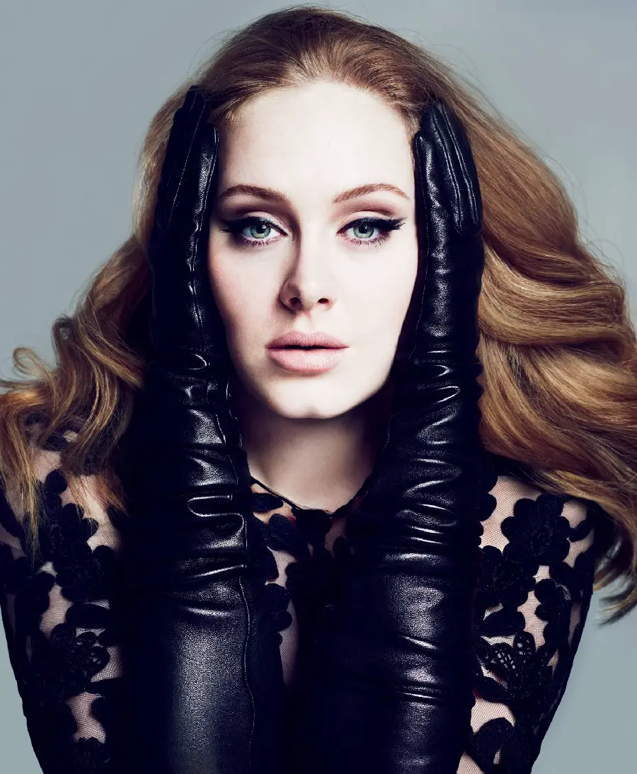 Luxurious and beautiful wallpaper with long gloves and black guipure dress and green eyes of the famous British singer Adele