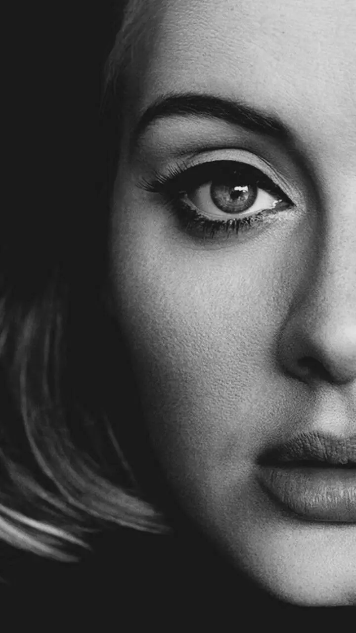 Download a high-quality, color-balanced photo of the famous British singer Adele's face in profile