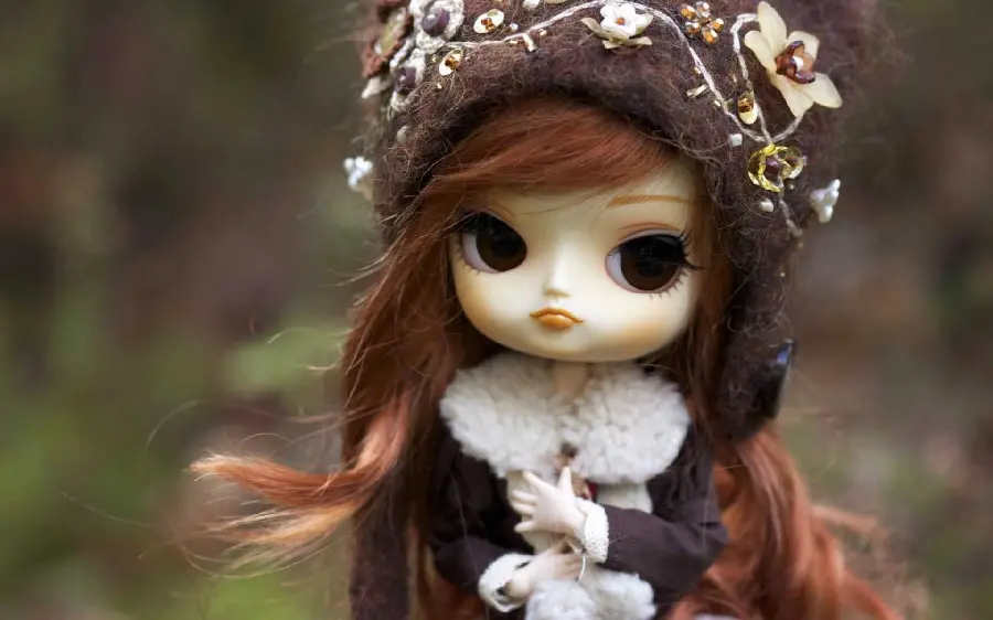 Download a lovely background of Brown Haired Doll Girl 