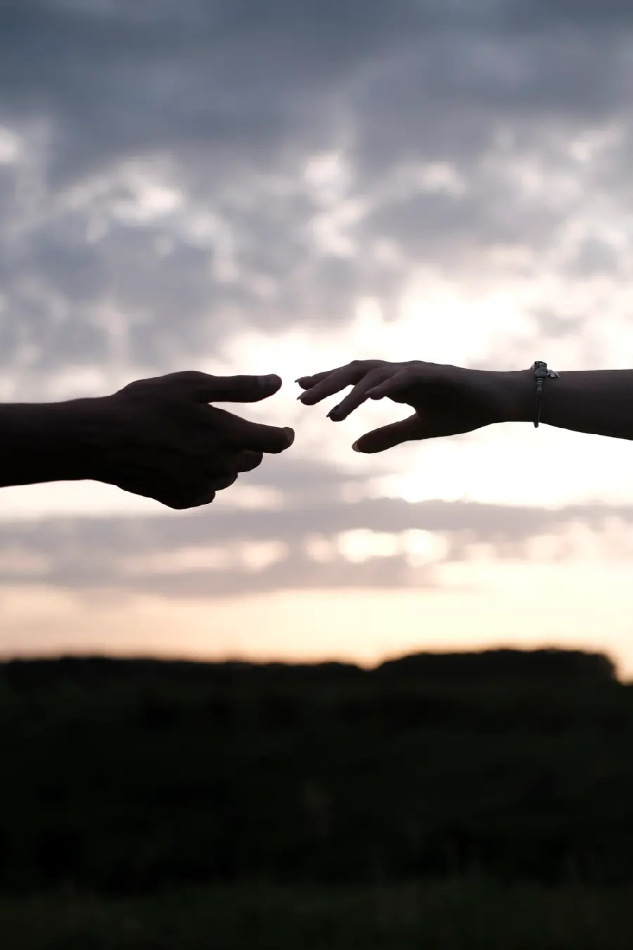 Lovely photo of the shadow of two lovers' hands in Full HD quality 