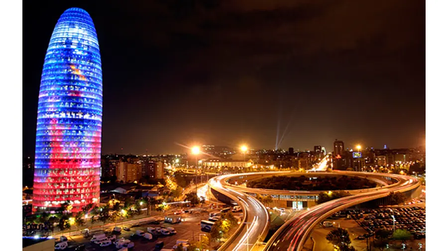 Download the lovely photo of the Agbar Tower, the tallest skyscraper in Barcelona, ​​at night