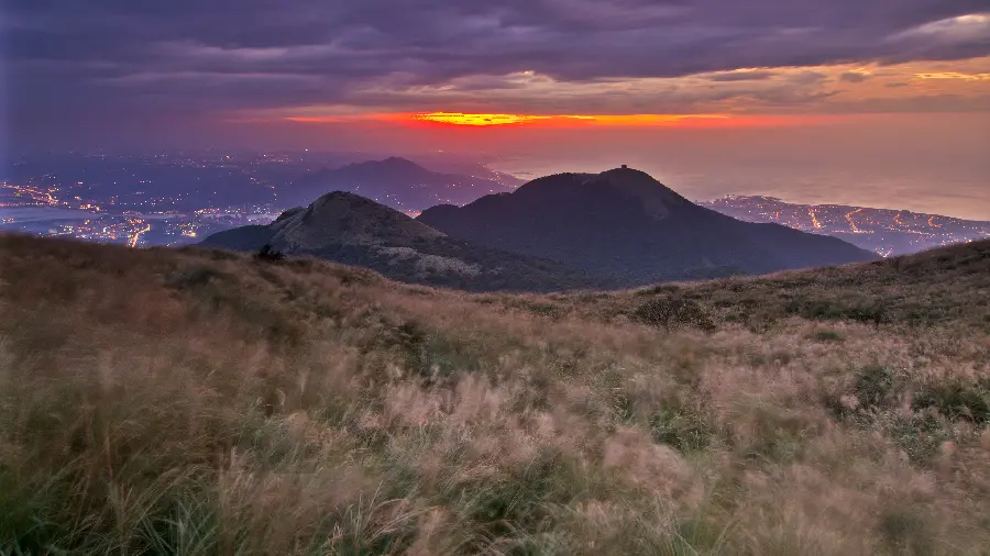 A stunning wallpaper of nature with a lovely purple and orange sky