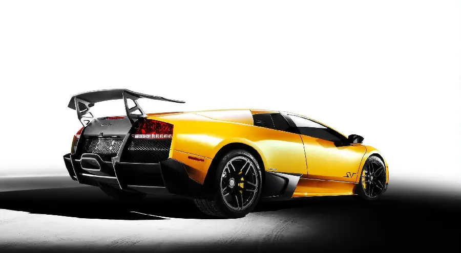 Dreamy laptop and computer background with the design of the yellow Lamborghini sports car 2022