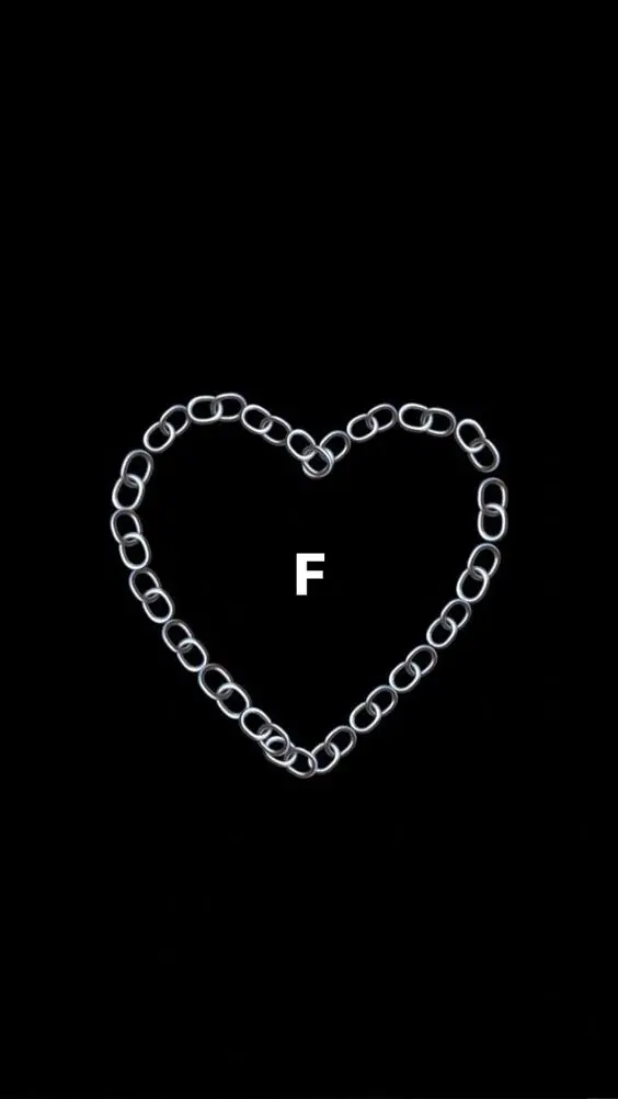 Download the background of a chained heart with the letter F imprisoned in it in high quality