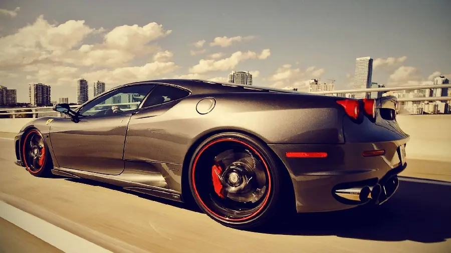 Beautiful wallpaper of a black Ferrari in Full HD quality 