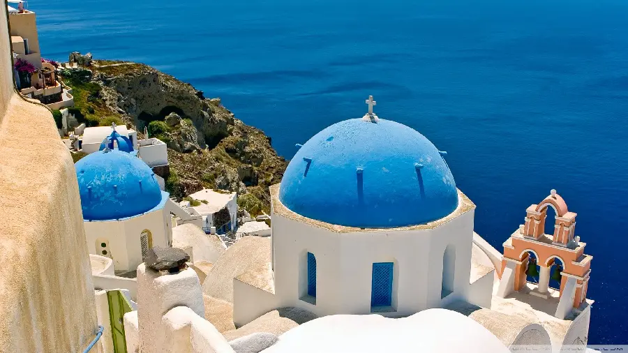 Beautiful photo of white houses on the island of Santorini, Greece, suitable for Telegram