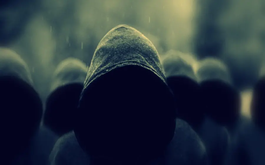 Scary photo of people with hidden faces in the rain for Instagram