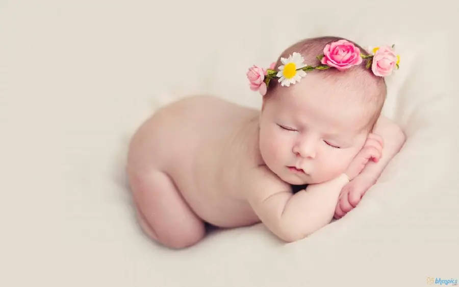 Studio photo of a beautiful baby girl a few days old with special quality 