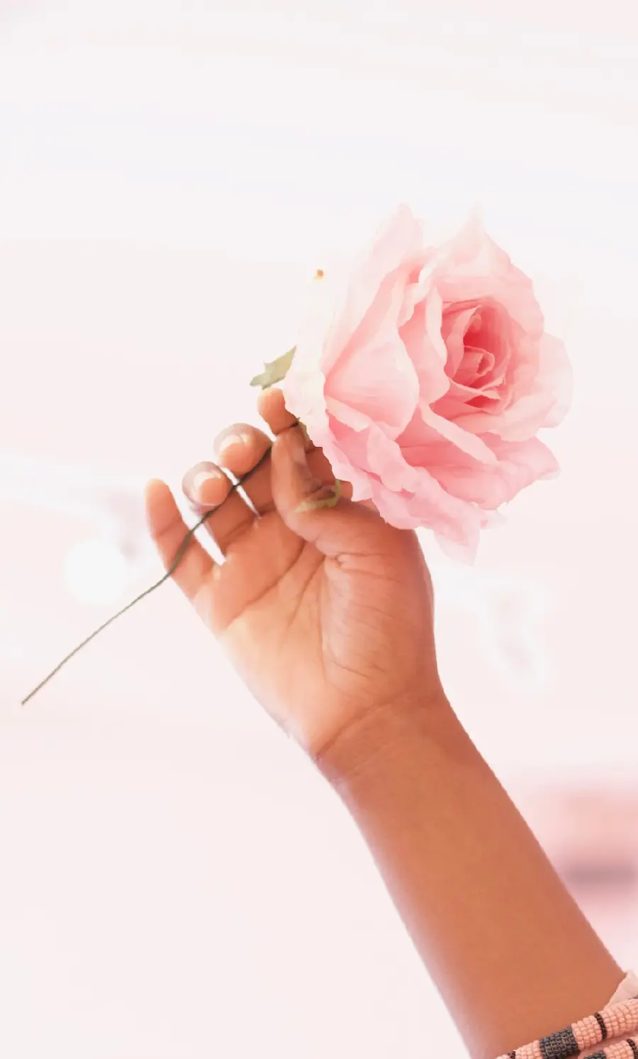 A poster of an artificial pink flower suitable for a phone