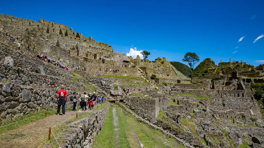 Nice background of tourists visiting the historic city of Machu Picchu