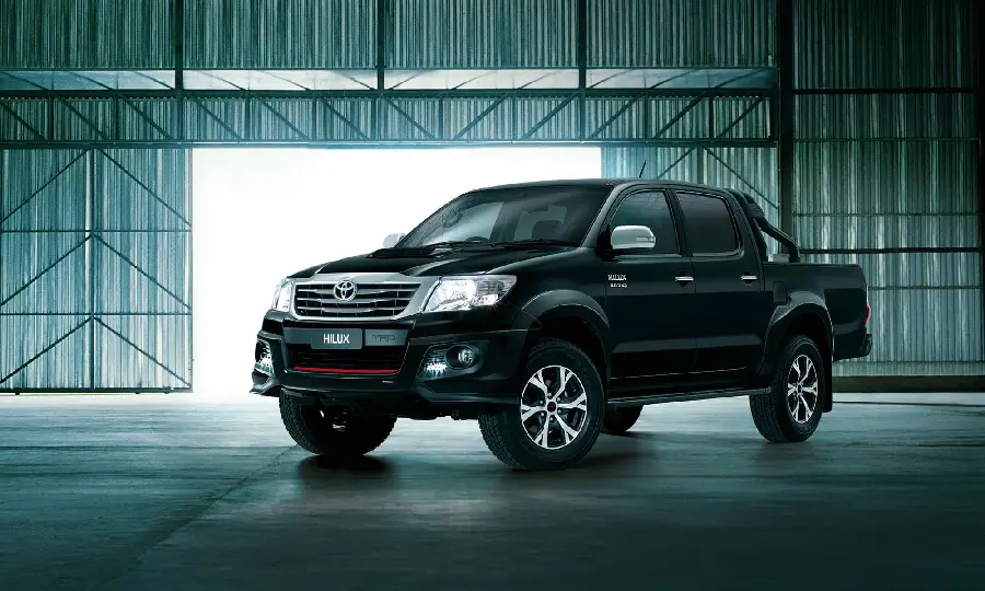A stunning wallpaper of a black Toyota Hilux for Windows