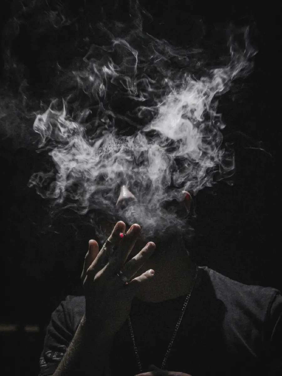 Cigarette background photo with a black background for your computer 