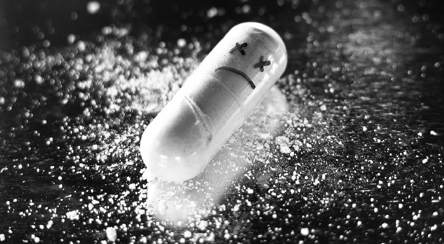 Strange Black and White Picture of a Tablet for a Sad Profile