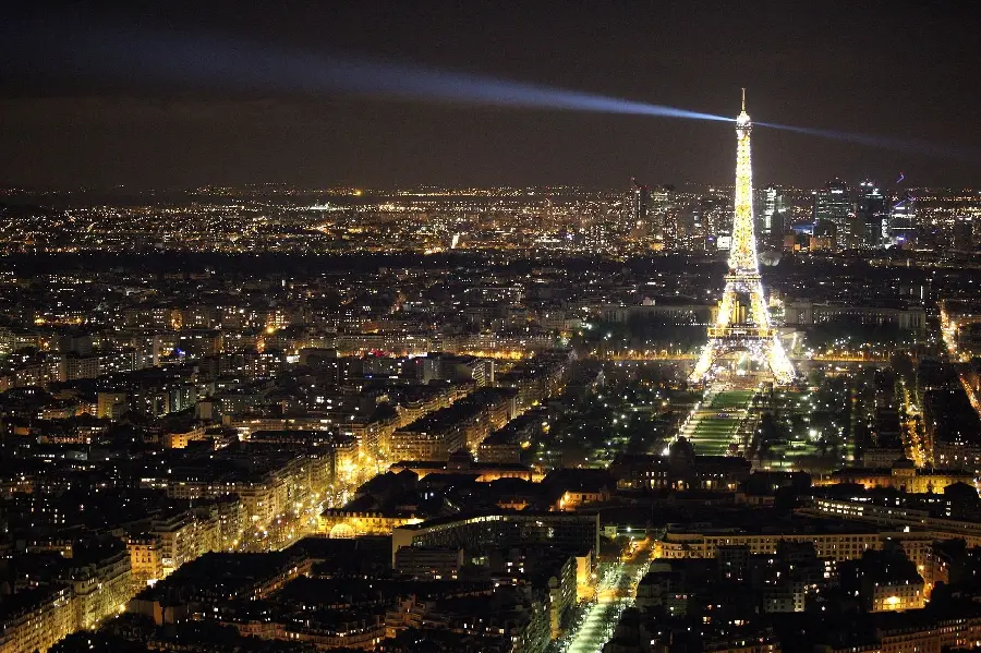 Stock image of the pearly glow of the Eiffel Tower in Paris and the symbol of the authority of French culture at night